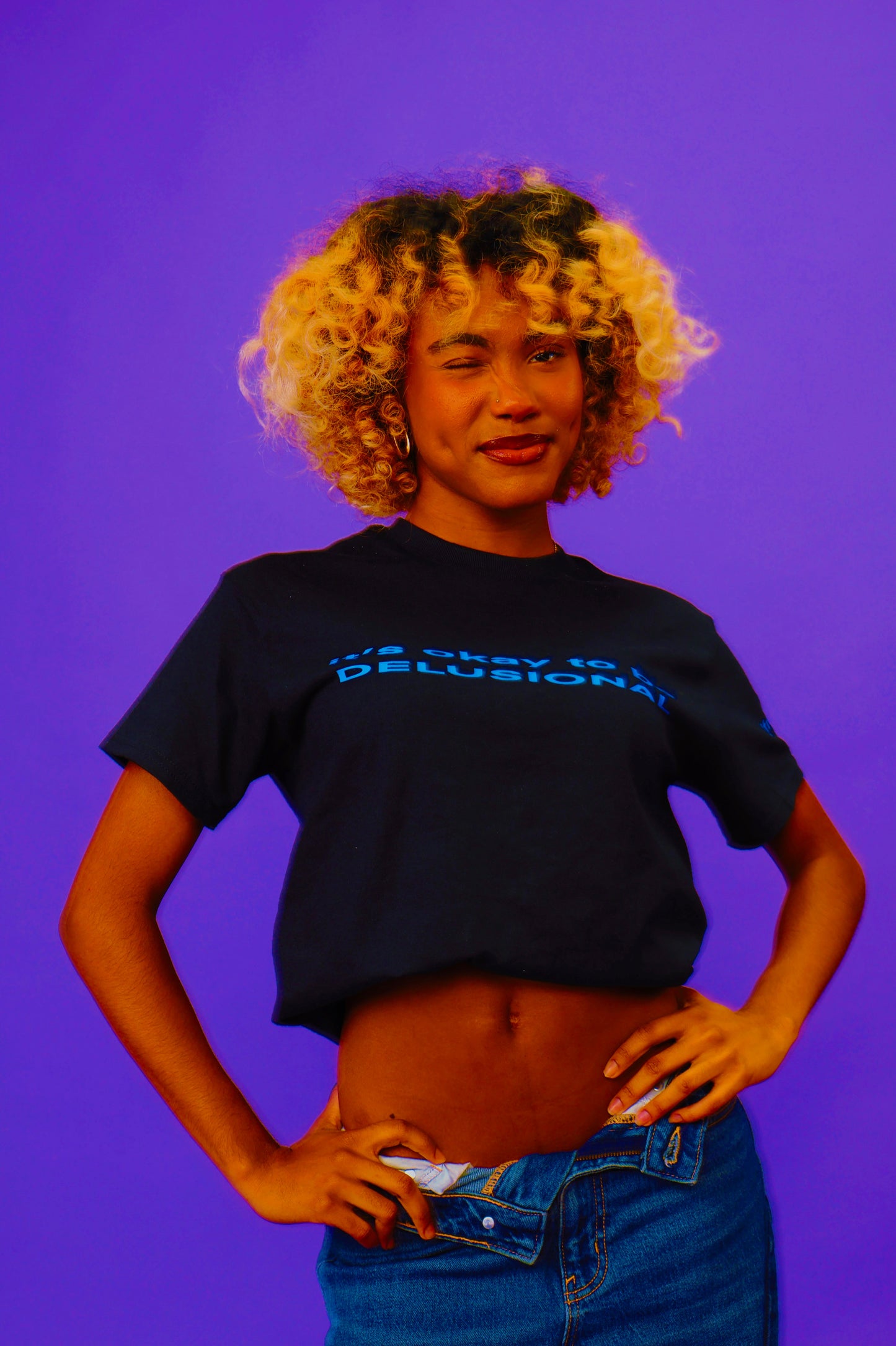 IT'S OKAY TO BE DELUSIONAL TEE [PRE-ORDER]