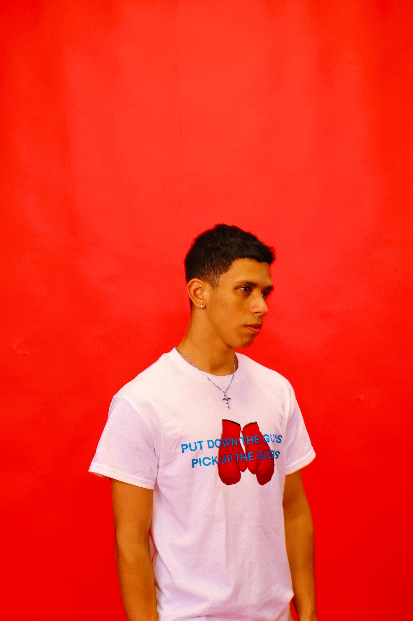 PUT DOWN THE GUNS N PICK UP THE GLOVES TEE [PRE-ORDER]